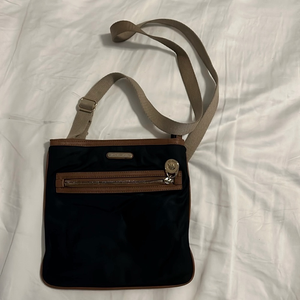 Lightly used Michael Kors crossover bag.
